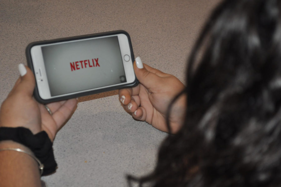 Ashley Bertillo watched Netflix on her phone. 