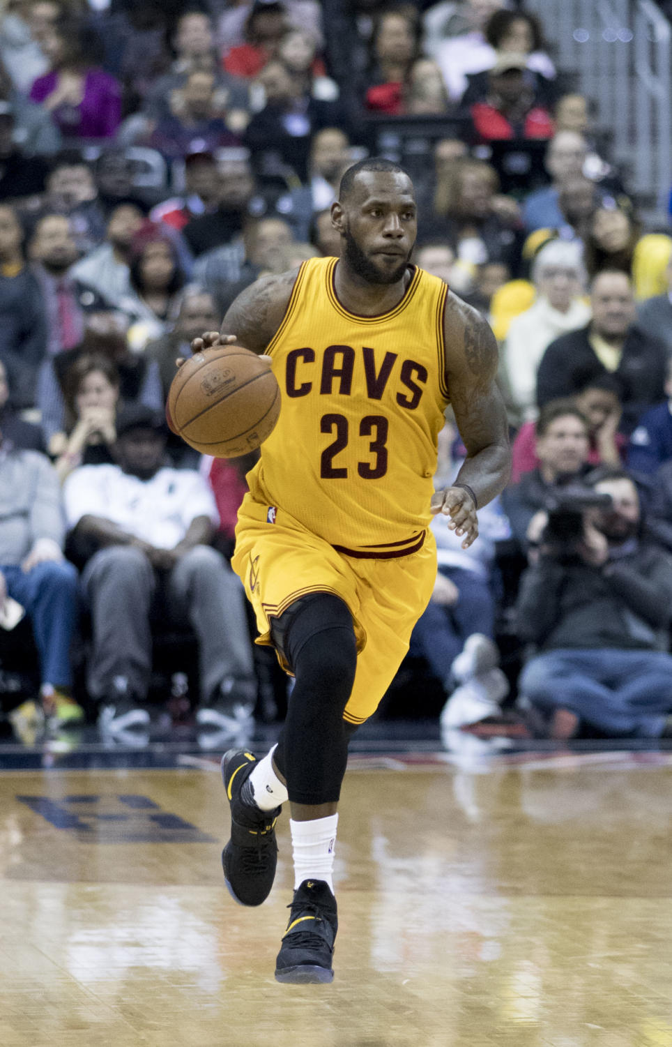 Lebron James takes the ball up the court in a crucial playoff game